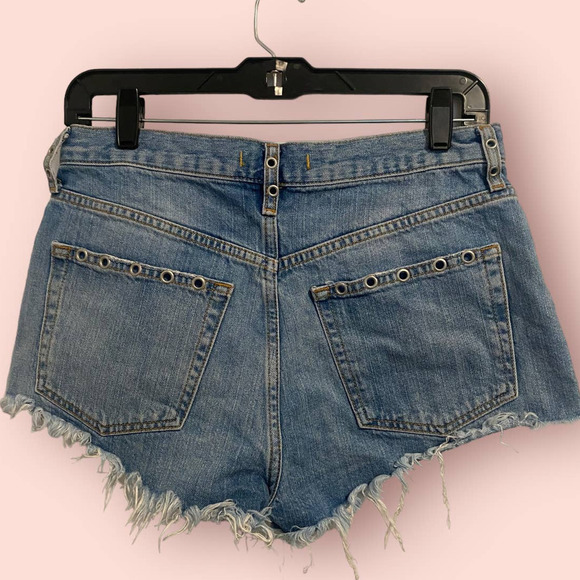 Free People Distressed Cutoff Shorts in Medium Blue Denim - Picture 2 of 7
